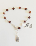 Bransoletka-różaniec z  bursztynu  srebrna